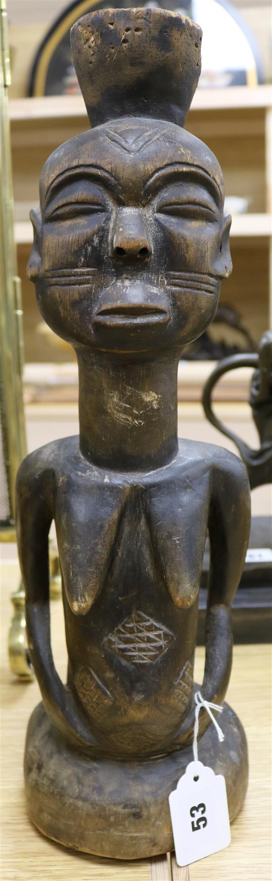 An African carved wood figure, height 43cm